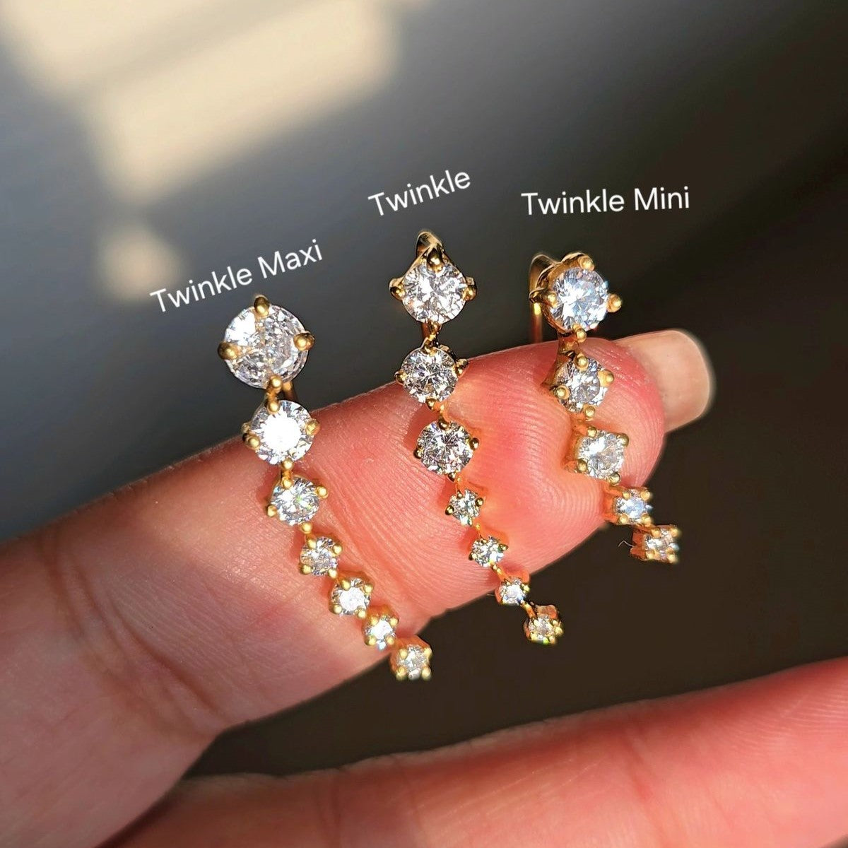White rhodium plated silver Twinkle Ear Sliders